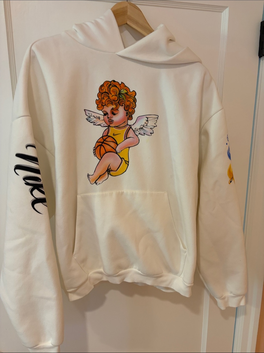 Nike Basketball Small Graphic Angel Cherub Hoodie Sweater with Yellow Accent
